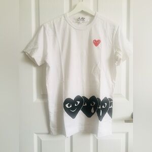 COMME DES GARÇONS PLAY 
Play’s iconic Black-face Heart T-Shirt